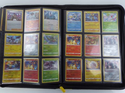 Lot x2 Pokémon Binders with an assortment of...