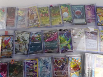 Lot Qty of Sleeved and top loaded Pokémon cards...