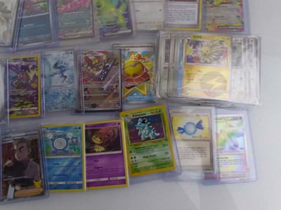 Lot Qty of Sleeved and top loaded Pokémon cards...