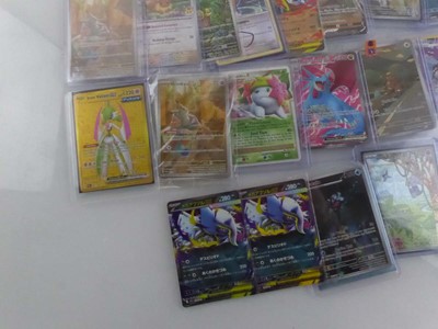 Lot Qty of Sleeved and top loaded Pokémon cards...