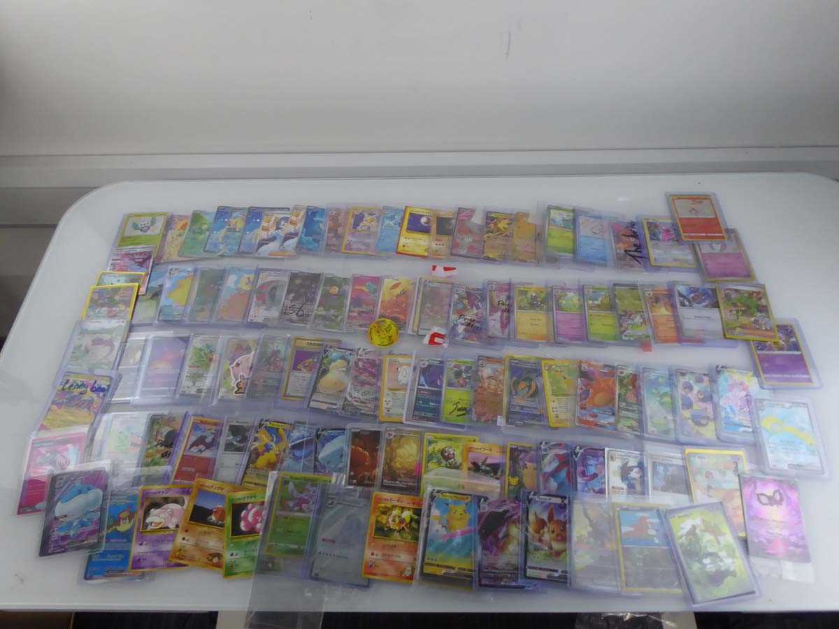 Lot Qty of Sleeved and top loaded Pokémon cards...