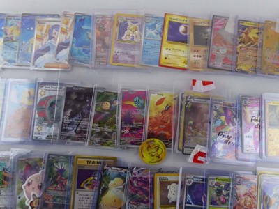 Lot Qty of Sleeved and top loaded Pokémon cards...