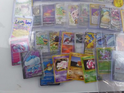 Lot Qty of Sleeved and top loaded Pokémon cards...