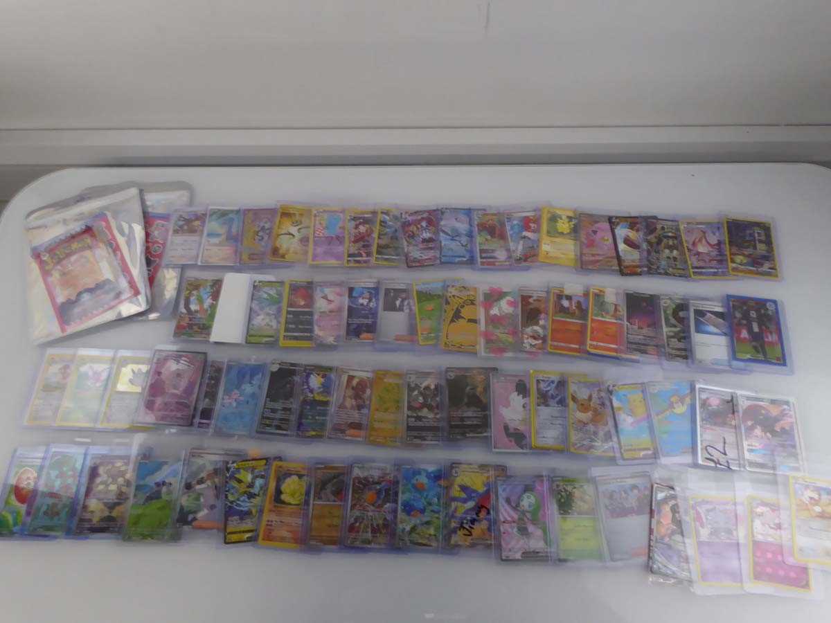 Lot Qty of Sleeved and top loaded Pokémon cards...