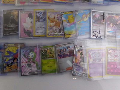 Lot Qty of Sleeved and top loaded Pokémon cards...