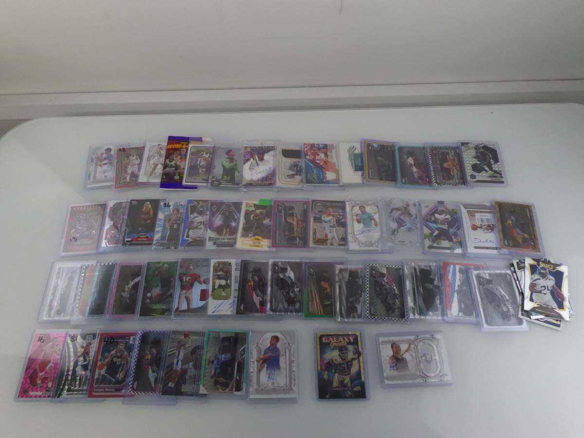 Lot Qty of Sleeved and top loaded Sport Trading...