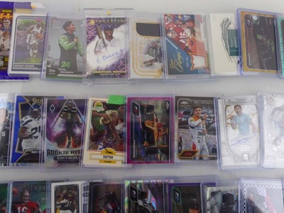 Lot Qty of Sleeved and top loaded Sport Trading...