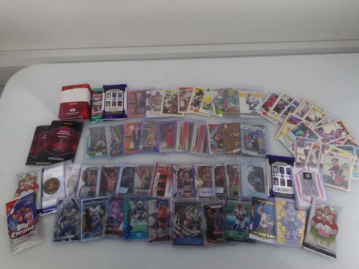 Lot Qty of Sleeved and top loaded sport trading...
