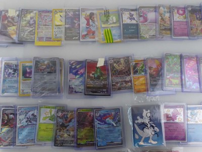 Lot Qty of Sleeved/Top Loaded Pokémon Cards from...