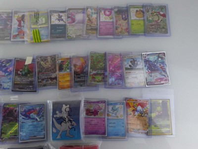Lot Qty of Sleeved/Top Loaded Pokémon Cards from...