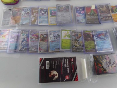 Lot Qty of Sleeved/Top Loaded Pokémon Cards from...