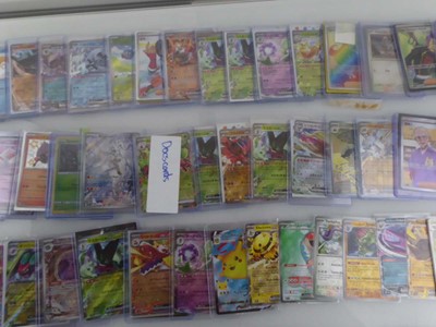 Lot Qty of Sleeved/Top Loaded Pokémon Cards from...