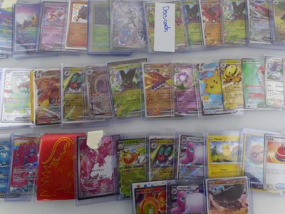 Lot Qty of Sleeved/Top Loaded Pokémon Cards from...
