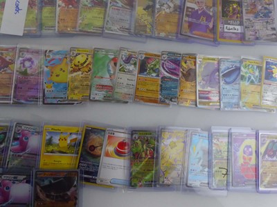 Lot Qty of Sleeved/Top Loaded Pokémon Cards from...