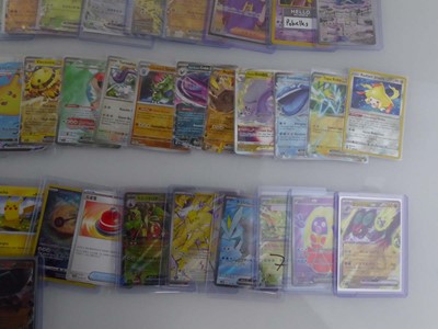 Lot Qty of Sleeved/Top Loaded Pokémon Cards from...