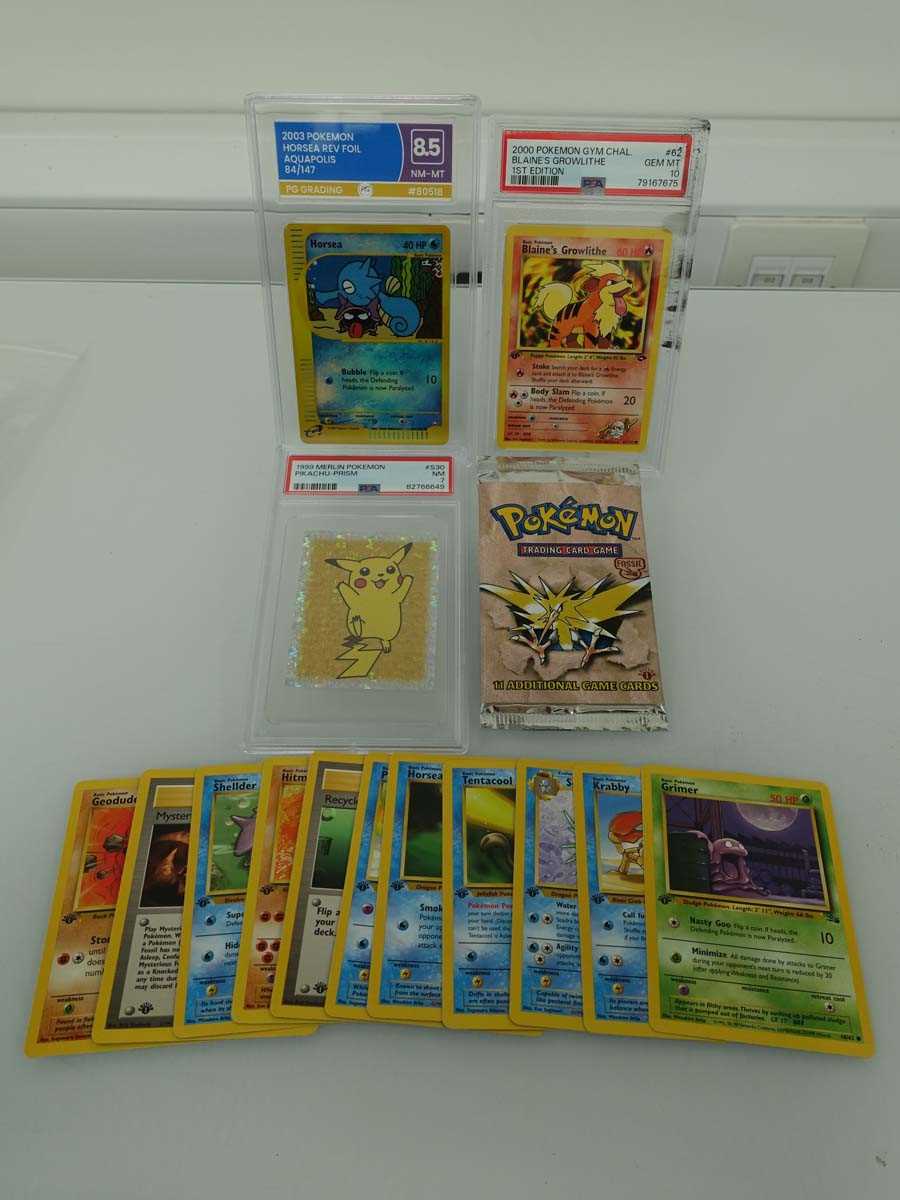 Lot Three assorted graded Pokémon cards/stickers...