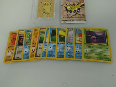 Lot Three assorted graded Pokémon cards/stickers...