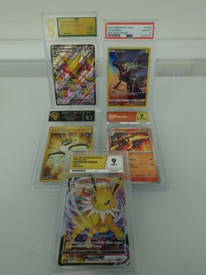 Lot Five assorted graded Pokémon cards to include...