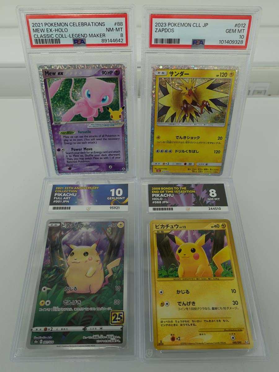 Lot Four assorted graded Pokémon cards to include...
