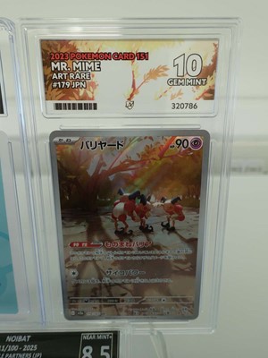 Lot Three assorted graded Pokémon cards to include...