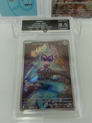 Lot Three assorted graded Pokémon cards to include...