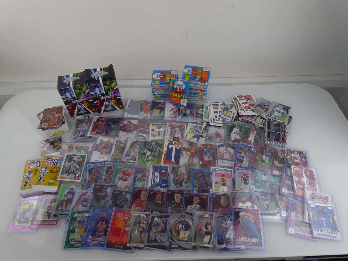 Lot Qty of Sleeved/Top Loaded Sports Trading cards...