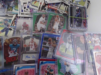 Lot Qty of Sleeved/Top Loaded Sports Trading cards...