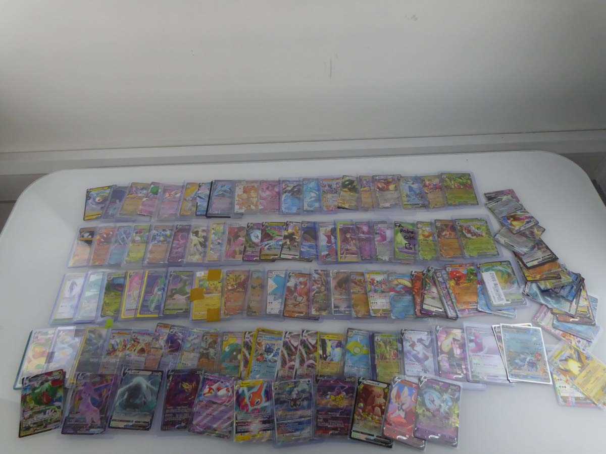 Lot Qty of Sleeved/Top Loaded Pokémon Trading Cards