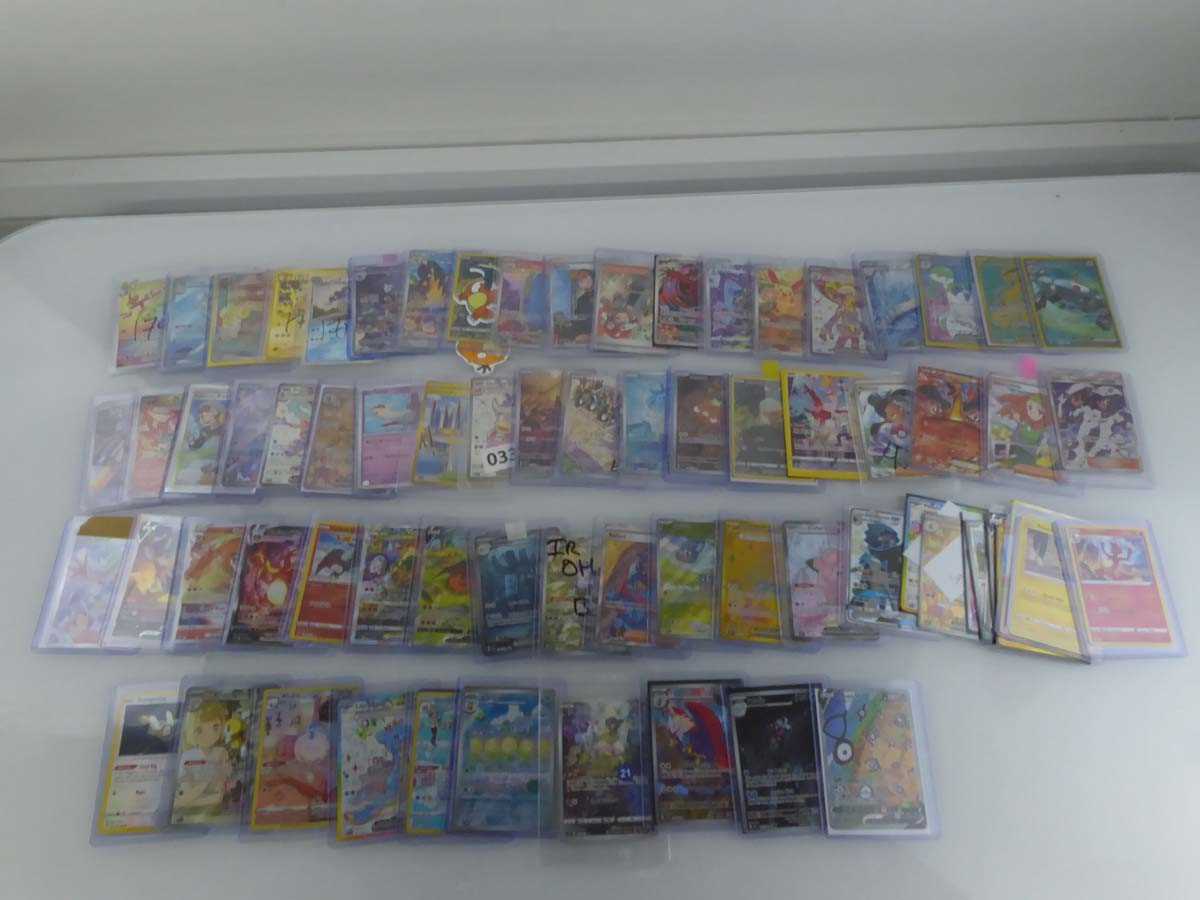 Lot Qty of Sleeved/Top Loaded Pokémon Trading Cards