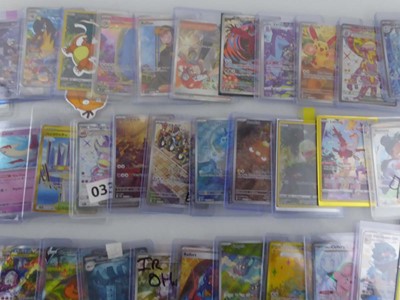 Lot Qty of Sleeved/Top Loaded Pokémon Trading Cards