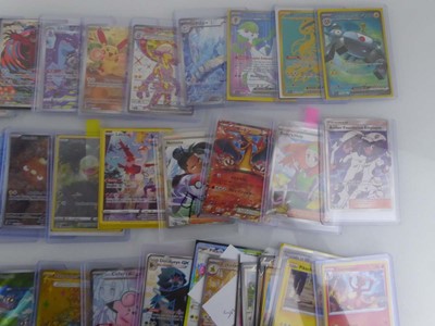Lot Qty of Sleeved/Top Loaded Pokémon Trading Cards