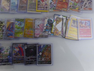 Lot Qty of Sleeved/Top Loaded Pokémon Trading Cards