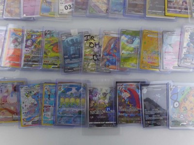 Lot Qty of Sleeved/Top Loaded Pokémon Trading Cards