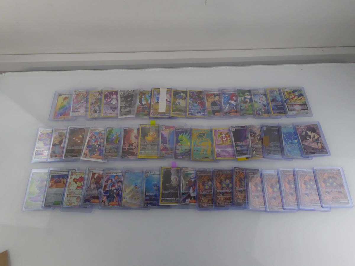 Lot Qty of Sleeved/Top Loaded Pokémon Trading Cards
