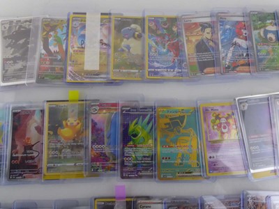 Lot Qty of Sleeved/Top Loaded Pokémon Trading Cards