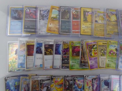 Lot Qty of Sleeved/Top Loaded Pokémon Trading Cards