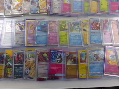 Lot Qty of Sleeved/Top Loaded Pokémon Trading Cards