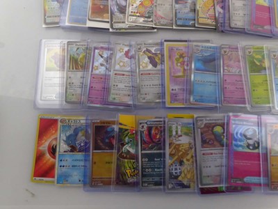 Lot Qty of Sleeved/Top Loaded Pokémon Trading Cards