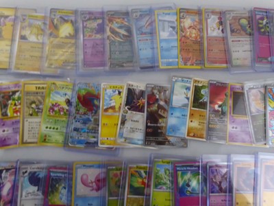 Lot Qty of Sleeved/Top Loaded Pokémon Trading Cards