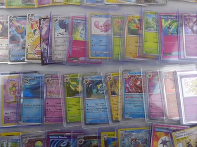 Lot Qty of Sleeved/Top Loaded Pokémon Trading Cards