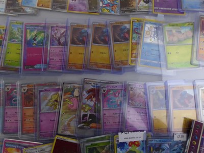 Lot Qty of Sleeved/Top Loaded Pokémon Trading Cards