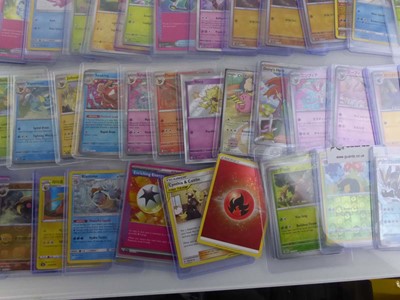 Lot Qty of Sleeved/Top Loaded Pokémon Trading Cards