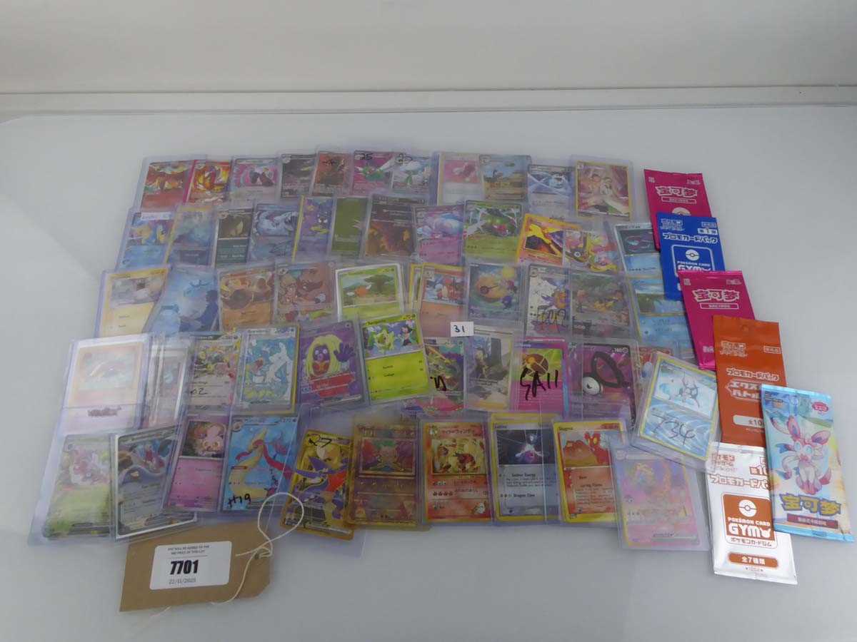 Lot Qty of Assorted Top Loaded Pokémon cards to...