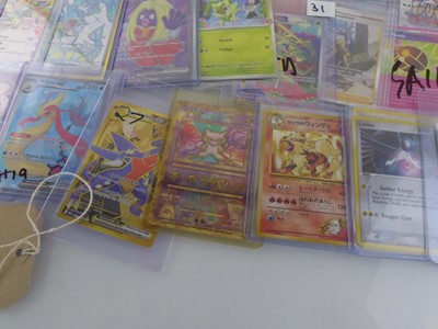 Lot Qty of Assorted Top Loaded Pokémon cards to...