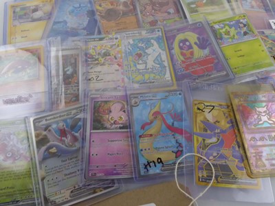 Lot Qty of Assorted Top Loaded Pokémon cards to...