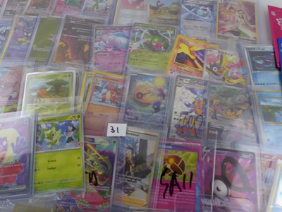 Lot Qty of Assorted Top Loaded Pokémon cards to...