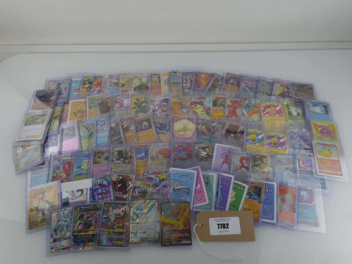 Lot Qty of Assorted Top Loaded Pokémon Cards to...