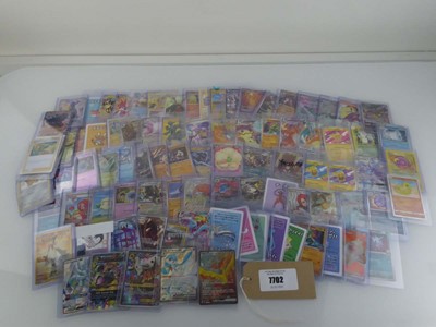 Lot Qty of Assorted Top Loaded Pokémon Cards to...