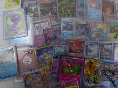 Lot Qty of Assorted Top Loaded Pokémon Cards to...