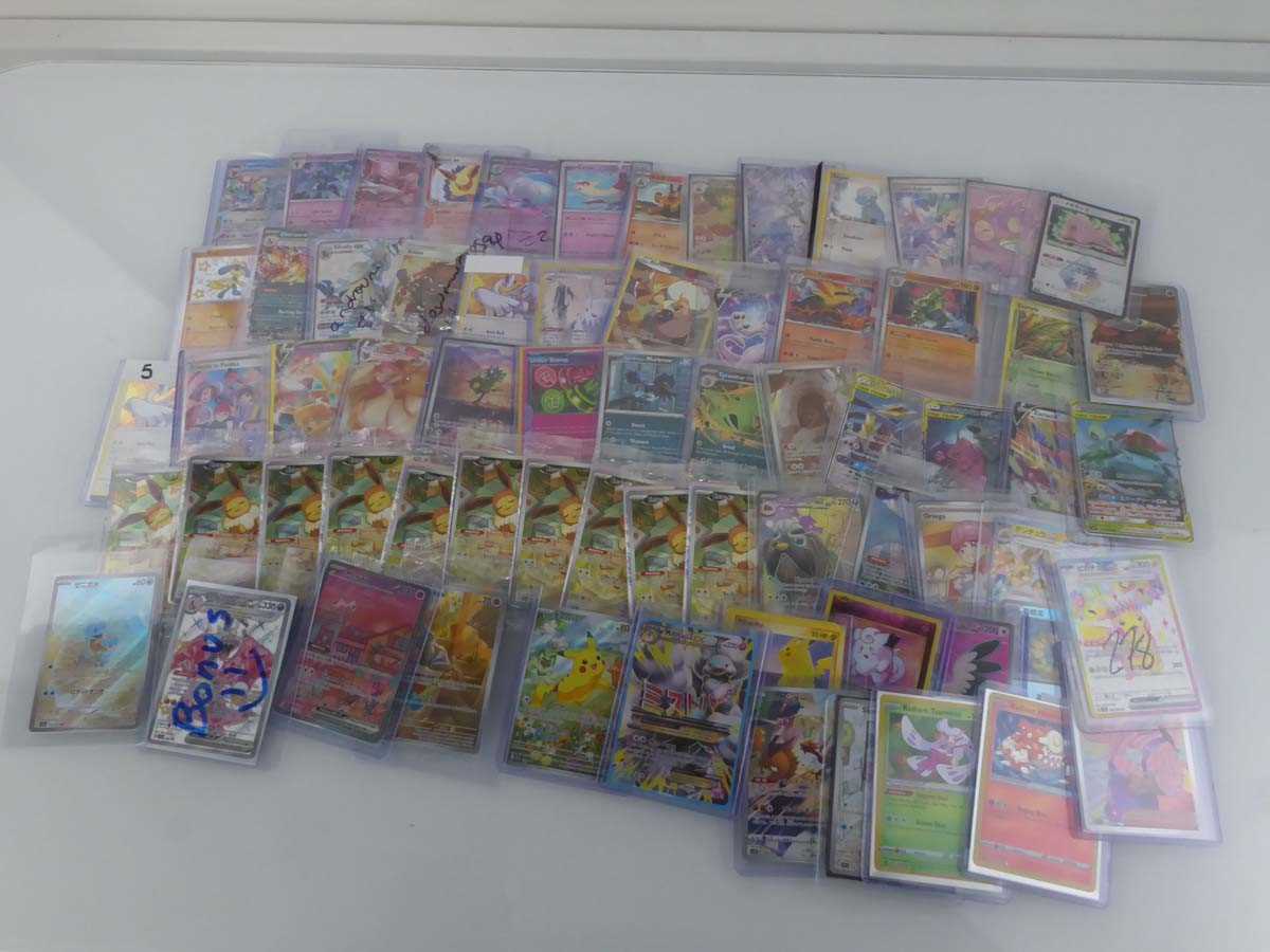Lot Qty of Top Loaded Pokémon Cards to Include...